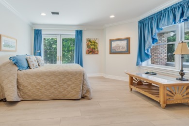 Timeless elegance on the bay behind the gates of prestigious on Regatta Bay Golf and Country Club in Florida - for sale on GolfHomes.com, golf home, golf lot