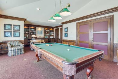 Timeless elegance on the bay behind the gates of prestigious on Regatta Bay Golf and Country Club in Florida - for sale on GolfHomes.com, golf home, golf lot