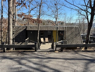 Welcome to your fully furnished lake retreat home featuring 4 on The Oaks Golf Course in Missouri - for sale on GolfHomes.com, golf home, golf lot