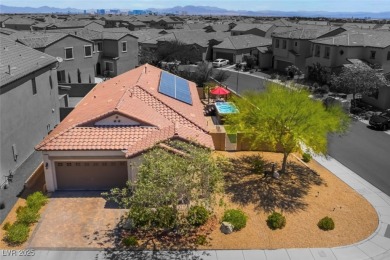 Paid-off solar panels and a prime corner lot with an expansive on Rhodes Ranch Golf Club in Nevada - for sale on GolfHomes.com, golf home, golf lot
