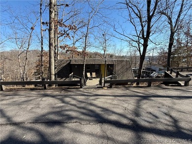 Welcome to your fully furnished lake retreat home featuring 4 on The Oaks Golf Course in Missouri - for sale on GolfHomes.com, golf home, golf lot