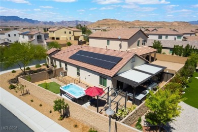 Paid-off solar panels and a prime corner lot with an expansive on Rhodes Ranch Golf Club in Nevada - for sale on GolfHomes.com, golf home, golf lot