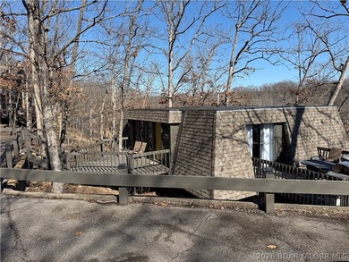 Welcome to your fully furnished lake retreat home featuring 4 on The Oaks Golf Course in Missouri - for sale on GolfHomes.com, golf home, golf lot