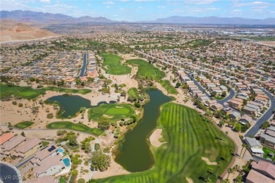 Paid-off solar panels and a prime corner lot with an expansive on Rhodes Ranch Golf Club in Nevada - for sale on GolfHomes.com, golf home, golf lot