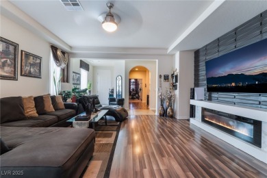Paid-off solar panels and a prime corner lot with an expansive on Rhodes Ranch Golf Club in Nevada - for sale on GolfHomes.com, golf home, golf lot