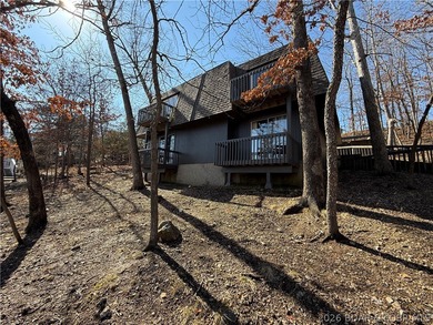 Welcome to your fully furnished lake retreat home featuring 4 on The Oaks Golf Course in Missouri - for sale on GolfHomes.com, golf home, golf lot