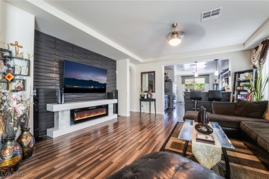 Paid-off solar panels and a prime corner lot with an expansive on Rhodes Ranch Golf Club in Nevada - for sale on GolfHomes.com, golf home, golf lot