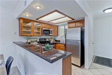Experience elevated living in this stunning second-floor condo on El Dorado Park Golf Course in California - for sale on GolfHomes.com, golf home, golf lot