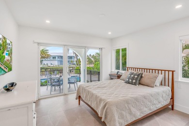 This exquisite 4 Bedroom, 4 Bathroom residence has been on Key Colony Beach Golf Course in Florida - for sale on GolfHomes.com, golf home, golf lot