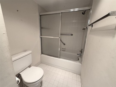 Discover the delightful charm of this distinctive property on Wynmoor Golf Course in Florida - for sale on GolfHomes.com, golf home, golf lot