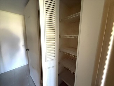 Discover the delightful charm of this distinctive property on Wynmoor Golf Course in Florida - for sale on GolfHomes.com, golf home, golf lot