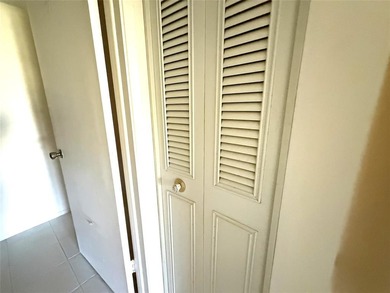 Discover the delightful charm of this distinctive property on Wynmoor Golf Course in Florida - for sale on GolfHomes.com, golf home, golf lot