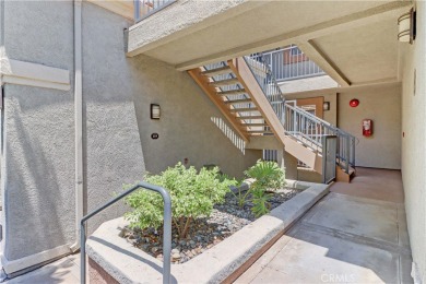 Experience elevated living in this stunning second-floor condo on El Dorado Park Golf Course in California - for sale on GolfHomes.com, golf home, golf lot