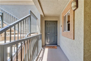 Experience elevated living in this stunning second-floor condo on El Dorado Park Golf Course in California - for sale on GolfHomes.com, golf home, golf lot