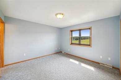 This 2 bedroom, 2 bath twin home sits on a beautiful country lot on Five Flags Golf Course in Wisconsin - for sale on GolfHomes.com, golf home, golf lot