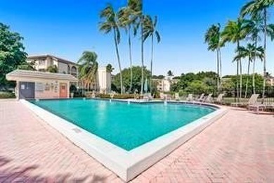 Discover the delightful charm of this distinctive property on Wynmoor Golf Course in Florida - for sale on GolfHomes.com, golf home, golf lot