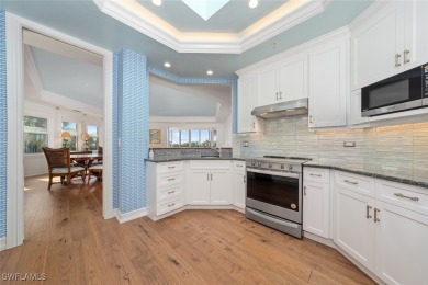This stunning penthouse offers sweeping views down the 9th on The Sanctuary Golf Club in Florida - for sale on GolfHomes.com, golf home, golf lot