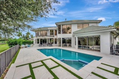 Luxury living in this magnificent gem nestled in the prestigious on Boca Grove Golf and Tennis in Florida - for sale on GolfHomes.com, golf home, golf lot