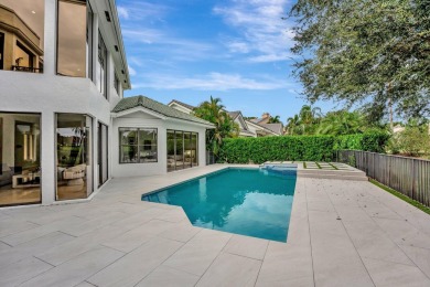 Luxury living in this magnificent gem nestled in the prestigious on Boca Grove Golf and Tennis in Florida - for sale on GolfHomes.com, golf home, golf lot