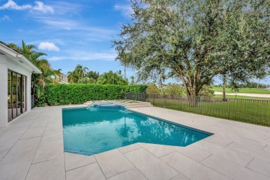 Luxury living in this magnificent gem nestled in the prestigious on Boca Grove Golf and Tennis in Florida - for sale on GolfHomes.com, golf home, golf lot