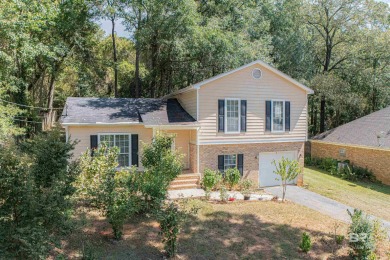 This charming tri-level has a lot of potential--1352 s.f. plus on Lake Forest Yacht and Country Club in Alabama - for sale on GolfHomes.com, golf home, golf lot