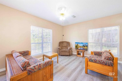 This charming tri-level has a lot of potential--1352 s.f. plus on Lake Forest Yacht and Country Club in Alabama - for sale on GolfHomes.com, golf home, golf lot