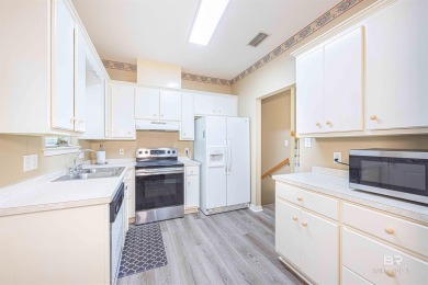 This charming tri-level has a lot of potential--1352 s.f. plus on Lake Forest Yacht and Country Club in Alabama - for sale on GolfHomes.com, golf home, golf lot