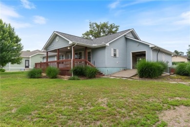 This immaculate 3 bed, 2 bath, 1,570 sq ft ranch-style home sits on Holiday Island Golf Course in Arkansas - for sale on GolfHomes.com, golf home, golf lot