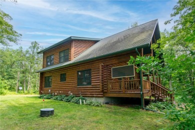 Discover the perfect blend of rustic charm and modern comfort in on Hardwoods Golf Club At Mille Lacs in Minnesota - for sale on GolfHomes.com, golf home, golf lot