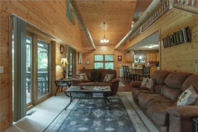 Discover the perfect blend of rustic charm and modern comfort in on Hardwoods Golf Club At Mille Lacs in Minnesota - for sale on GolfHomes.com, golf home, golf lot