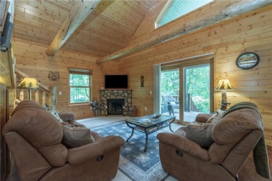 Discover the perfect blend of rustic charm and modern comfort in on Hardwoods Golf Club At Mille Lacs in Minnesota - for sale on GolfHomes.com, golf home, golf lot