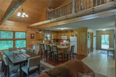 Discover the perfect blend of rustic charm and modern comfort in on Hardwoods Golf Club At Mille Lacs in Minnesota - for sale on GolfHomes.com, golf home, golf lot