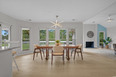 Nestled on a stunning HALF-ACRE corner lot directly on the on Myrtle Beach National Golf Course in South Carolina - for sale on GolfHomes.com, golf home, golf lot
