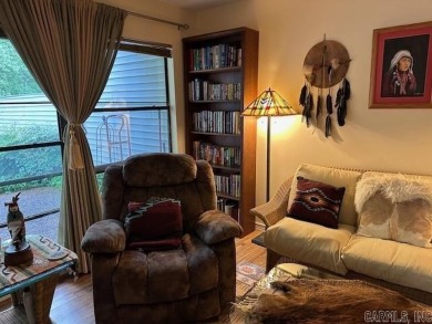 Discover the allure of modern living in this beautifully on Indian Hills Country Club in Arkansas - for sale on GolfHomes.com, golf home, golf lot