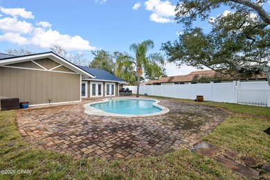 Thoughtfully reimagined from top to bottom, this stunning Panama on Bay Point Resort Golf Club in Florida - for sale on GolfHomes.com, golf home, golf lot
