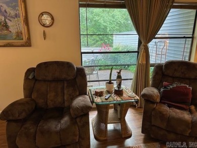 Discover the allure of modern living in this beautifully on Indian Hills Country Club in Arkansas - for sale on GolfHomes.com, golf home, golf lot