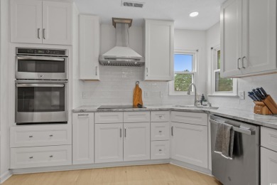 Nestled on a stunning HALF-ACRE corner lot directly on the on Myrtle Beach National Golf Course in South Carolina - for sale on GolfHomes.com, golf home, golf lot