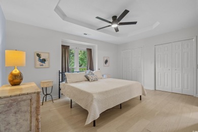 Nestled on a stunning HALF-ACRE corner lot directly on the on Myrtle Beach National Golf Course in South Carolina - for sale on GolfHomes.com, golf home, golf lot