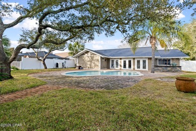 Thoughtfully reimagined from top to bottom, this stunning Panama on Bay Point Resort Golf Club in Florida - for sale on GolfHomes.com, golf home, golf lot