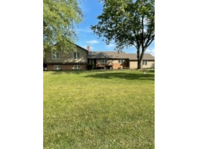 Stop your search. Meticulously maintained 4 bedroom 3 bath quad on Prairie Isle Golf Course in Illinois - for sale on GolfHomes.com, golf home, golf lot