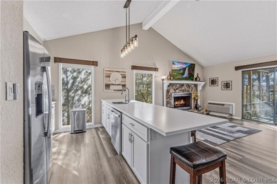 Neighboring Margaritaville Lake Resort, this property delivers on The Oaks Golf Course in Missouri - for sale on GolfHomes.com, golf home, golf lot