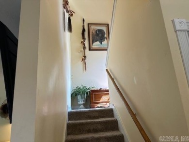 Discover the allure of modern living in this beautifully on Indian Hills Country Club in Arkansas - for sale on GolfHomes.com, golf home, golf lot