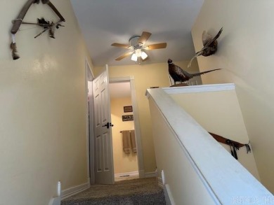 Discover the allure of modern living in this beautifully on Indian Hills Country Club in Arkansas - for sale on GolfHomes.com, golf home, golf lot