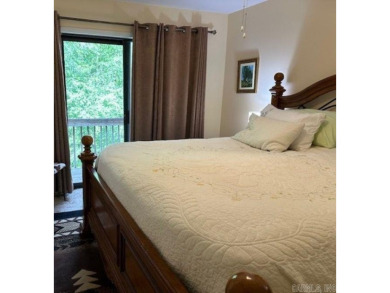 Discover the allure of modern living in this beautifully on Indian Hills Country Club in Arkansas - for sale on GolfHomes.com, golf home, golf lot