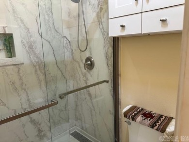 Discover the allure of modern living in this beautifully on Indian Hills Country Club in Arkansas - for sale on GolfHomes.com, golf home, golf lot