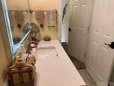 Discover the allure of modern living in this beautifully on Indian Hills Country Club in Arkansas - for sale on GolfHomes.com, golf home, golf lot