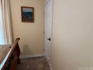 Discover the allure of modern living in this beautifully on Indian Hills Country Club in Arkansas - for sale on GolfHomes.com, golf home, golf lot