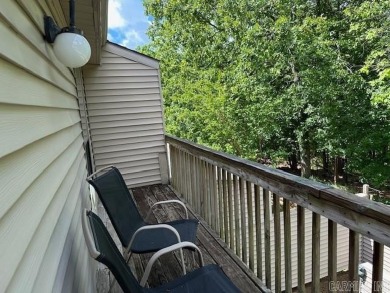 Discover the allure of modern living in this beautifully on Indian Hills Country Club in Arkansas - for sale on GolfHomes.com, golf home, golf lot