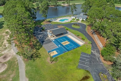 Nestled on a stunning HALF-ACRE corner lot directly on the on Myrtle Beach National Golf Course in South Carolina - for sale on GolfHomes.com, golf home, golf lot