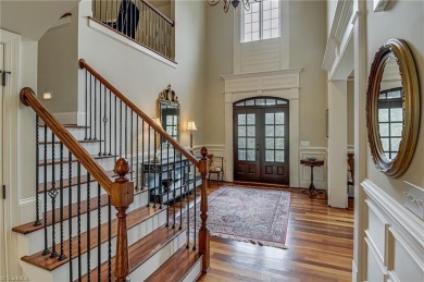 Exquisite offering in Salem Glen, overlooking the 14th Hole on Salem Glen Country Club in North Carolina - for sale on GolfHomes.com, golf home, golf lot